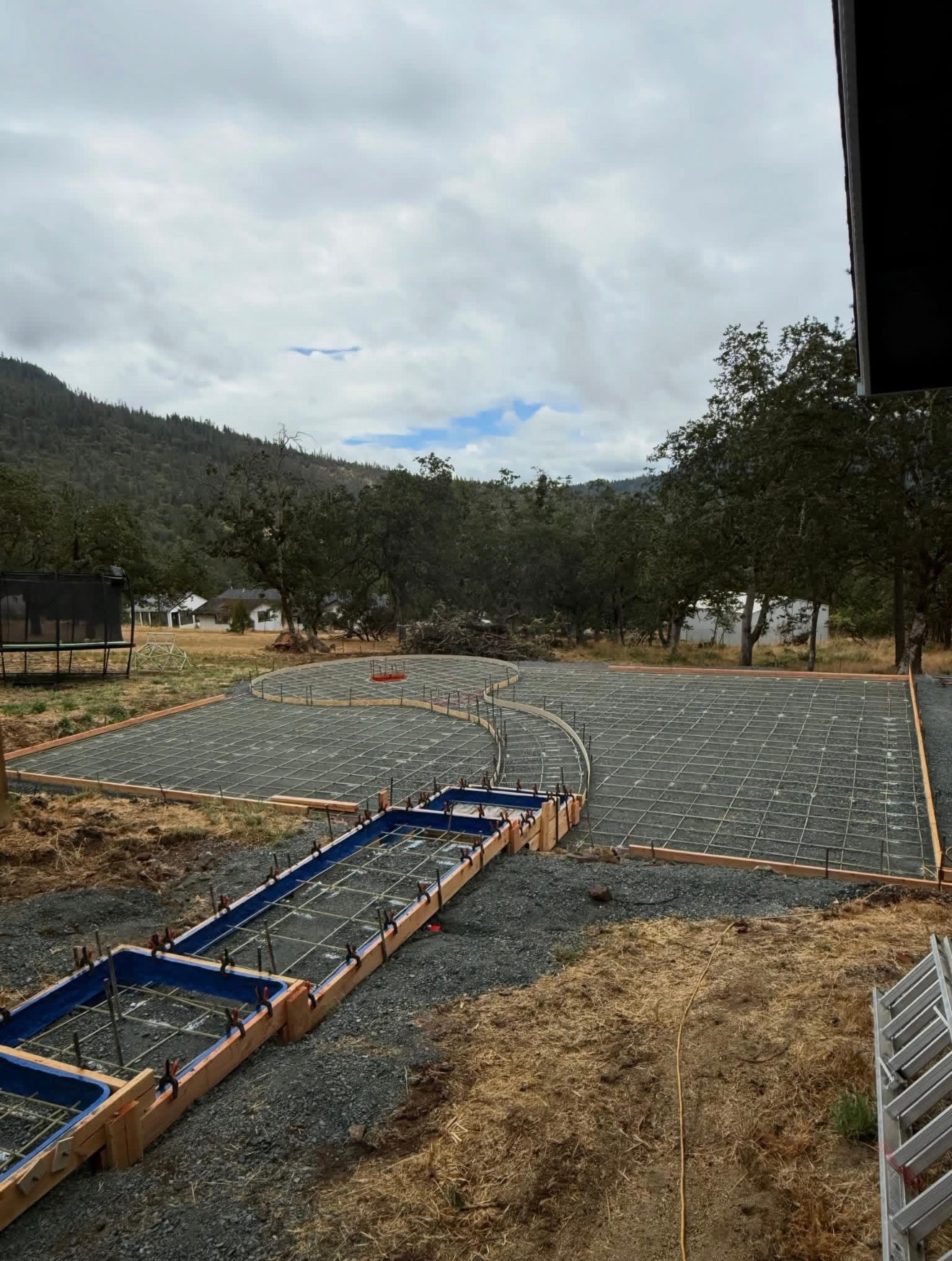 Foundation slab poured for garage addition