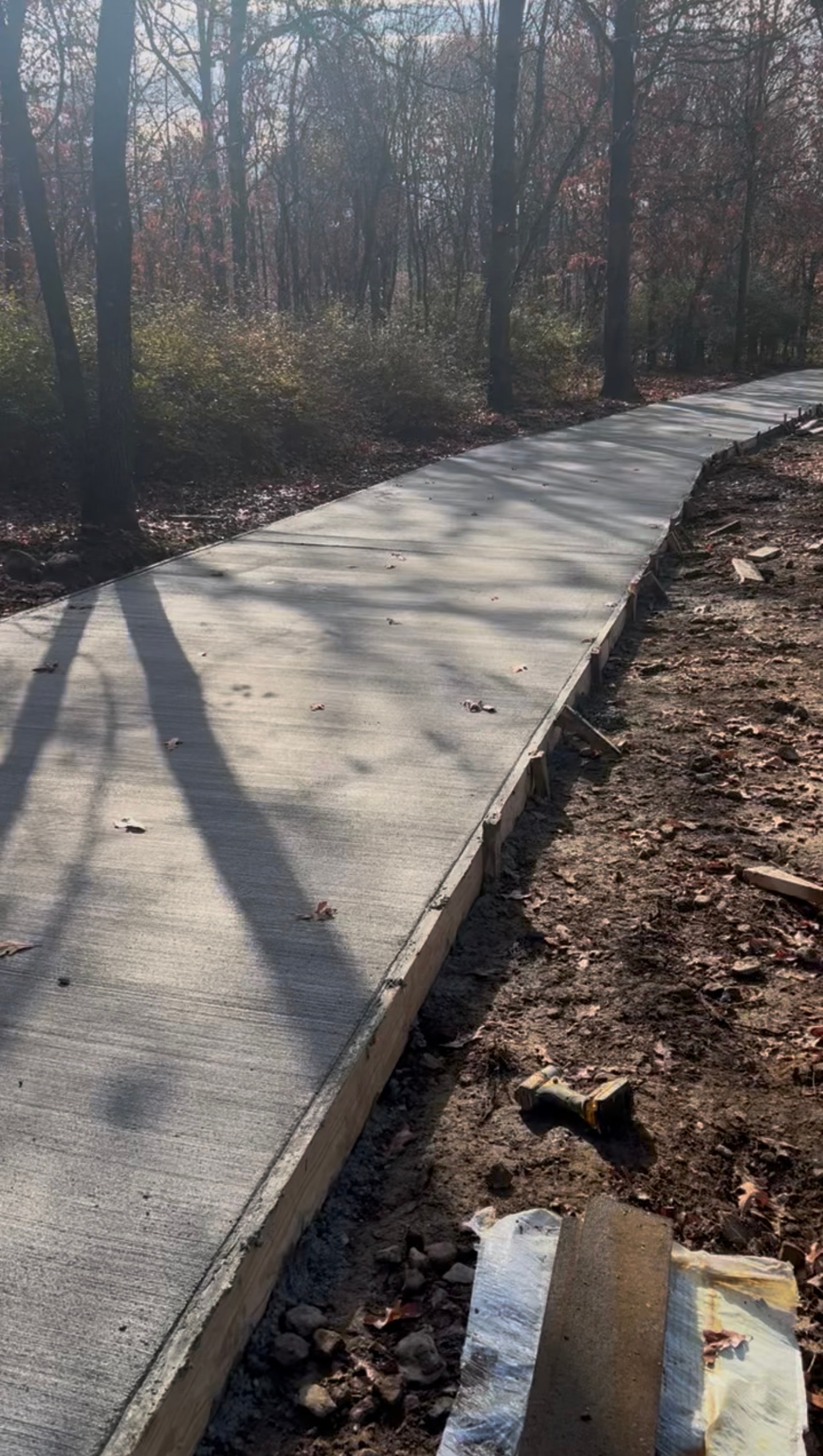 Concrete driveway replacement — old surface removed and new slab poured